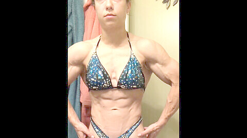 Muscular woman showing off her hard-earned gains