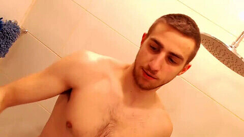 Hairy Russian hunk Ivan enjoys a steamy bathroom jerk off