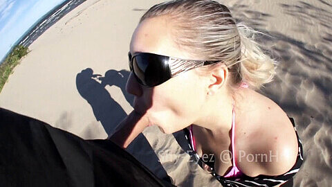Fellation et éjaculation faciale à la plage en public pour jeune canadienne Bashful-Eyez