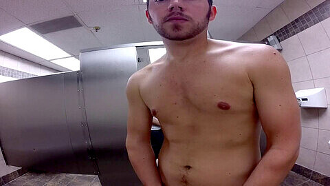 Spontaneous public restroom encounter leads to steamy amateur gay oral