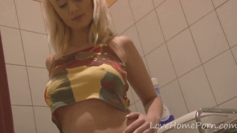 Blonde hottie indulges in shower masturbation session