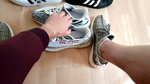 Sexy porn star plays with Yeezy 350 and Adidas sneakers before receiving a hot load