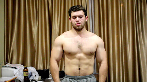 Muscular Russian hunk shows off his strength