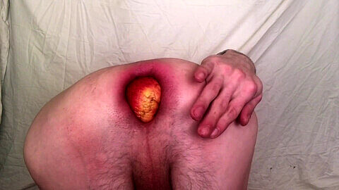 Juicy apple explores deep within the rectum