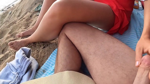 Amazing handjob on a public beach - Risky outdoor sex adventure!