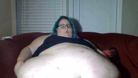 Extremely plump SSBBW stands up, showing off her massive belly and fat apron