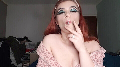 Seductive smoking fetish with a mesmerizing teen beauty blowing smoke in your face