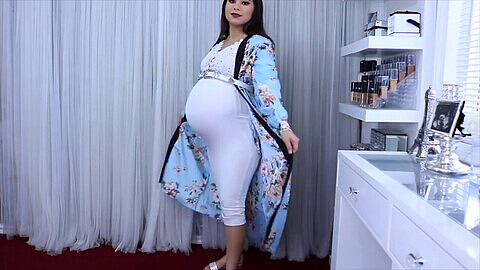 Horny milf demonstrates big pregnant belly