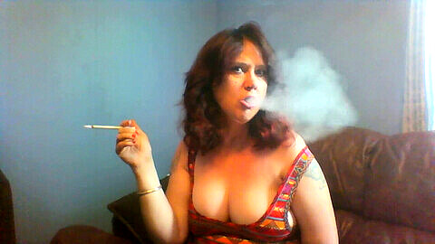 Sexy mom smoking Misty 120s in kinky video