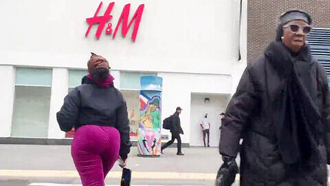 Curvy black MILF in purple sweatpants caught on hidden cam showcasing her big round booty