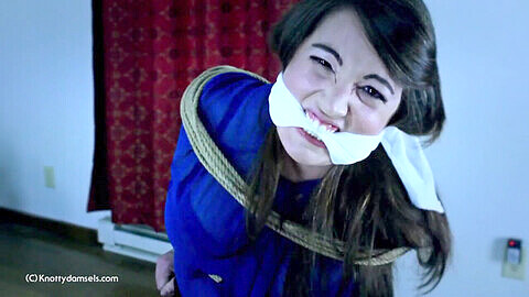 Elizabeth Andrews, the curious detective, gets tied up and gagged
