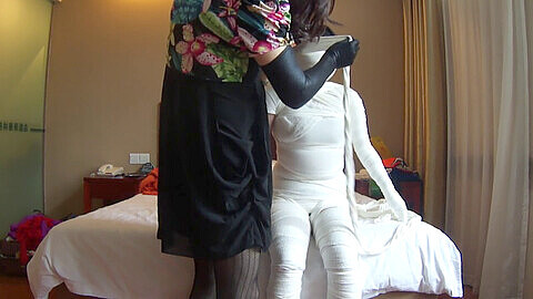 Wrapped in latex, dominated and helpless