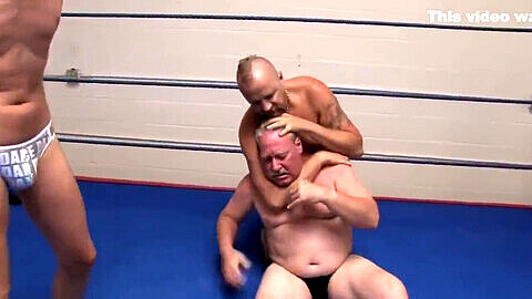 Two beefy daddies in revealing thongs take on the wrestling challenge!