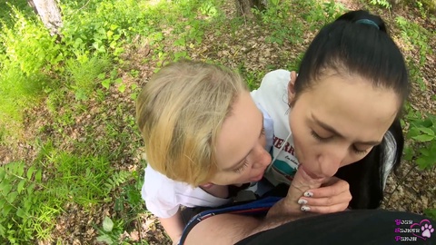Two hot girls deep-throating and sucking cock in a wild outdoor threesome!
