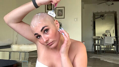nymph shaves Her Head slick
