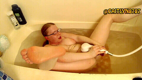 Playing with adult toys in the bathtub - hot brunette cums hard with showerhead and dildo!