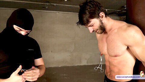 Gay bondage fetish clip featuring a submissive slave with sensitive nipples