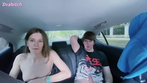 Petite brunette gets fucked in a car with people walking by