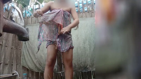 Sensual bathing session of an Indian village beauty caught on camera