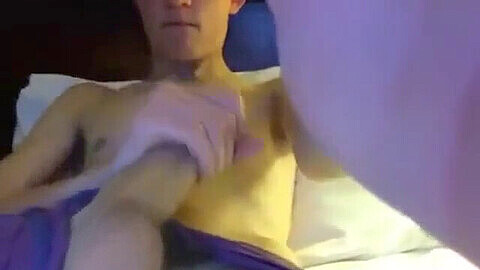 Young guy jerking off in a hotel room