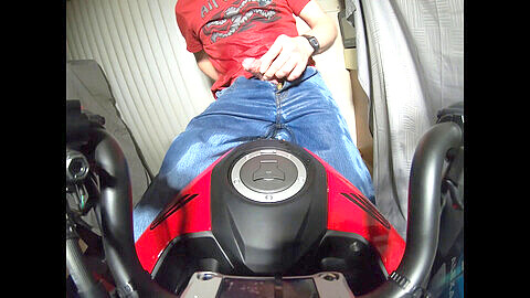 Wet and messy motorcycle ride indoors - jeans soaked with piss and jizz!